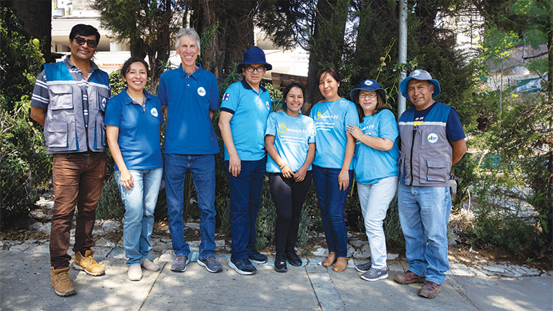 26-31-Joe-Filo-Loney-1 Maryknoll Lay Missioners Joe Loney (third from left) and Filo Siles (second from right) pose with Social Justice Foundation staff at the Maryknoll center. (Adam Mitchell/Bolivia)