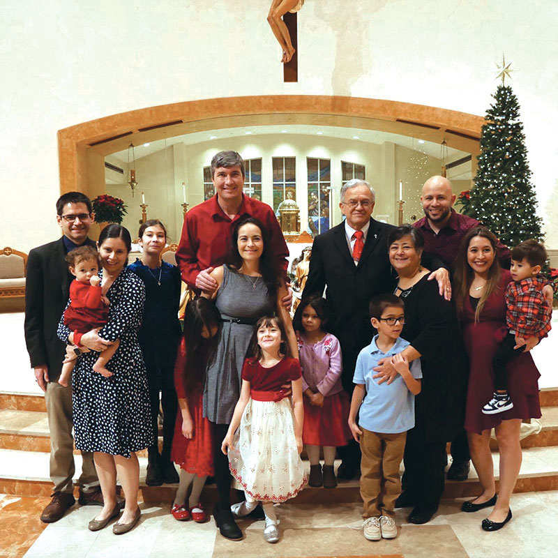 The Monterrubios gather for Christmas Mass at Saint Paul the Apostle Church. (Courtesy of Arturo and Esperanza Monterrubio/U.S.)