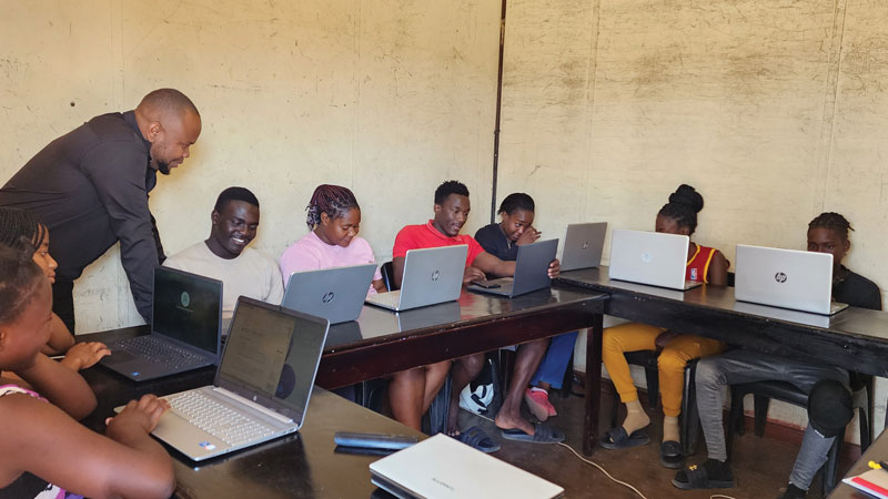 W25-sister-chiyoung-pak-3 The Norton Center offers the only free computer classes for adults in the community. Ten laptops are shared in two sessions, serving 20 students. (Courtesy of Chiyoung Pak/Zimbabwe)