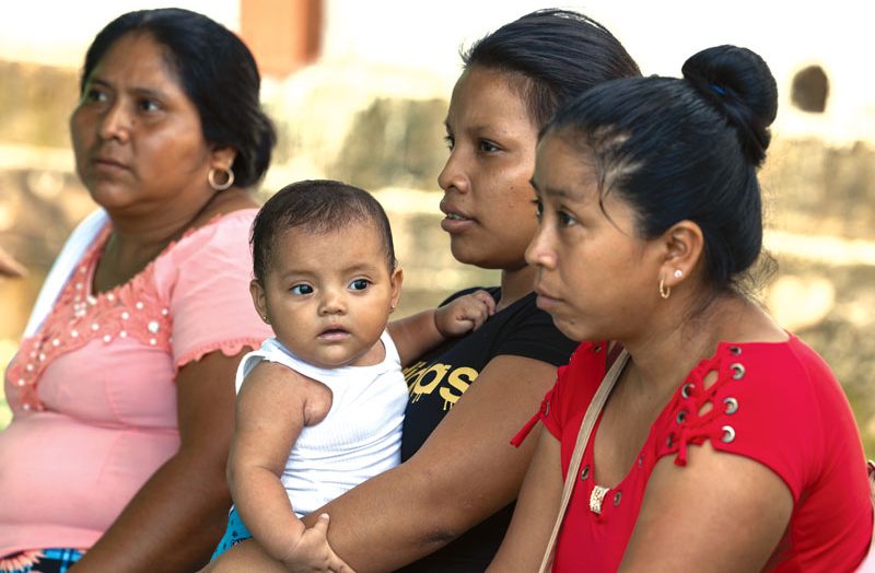 Patients wait to be seen by Sister Daoust at a two-room outpost clinic built next to the Catholic church of Nicá. (Octavio Durán/Guatemala)