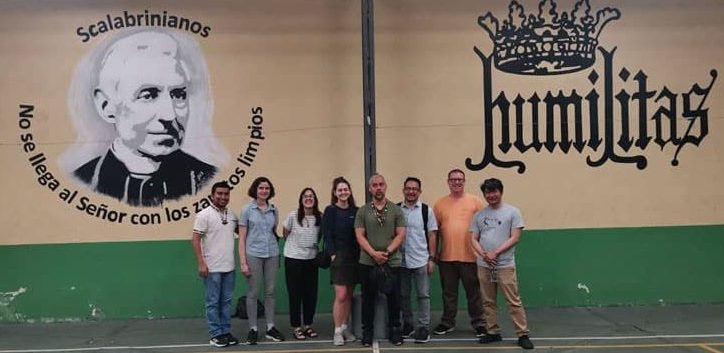 Deacon Leonel Yoque (third from right) led a Maryknoll mission immersion trip to Guatemala, where he and participants visited Casa del Migrante in Guatemala City. (Courtesy of Leonel Yoque/Guatemala)