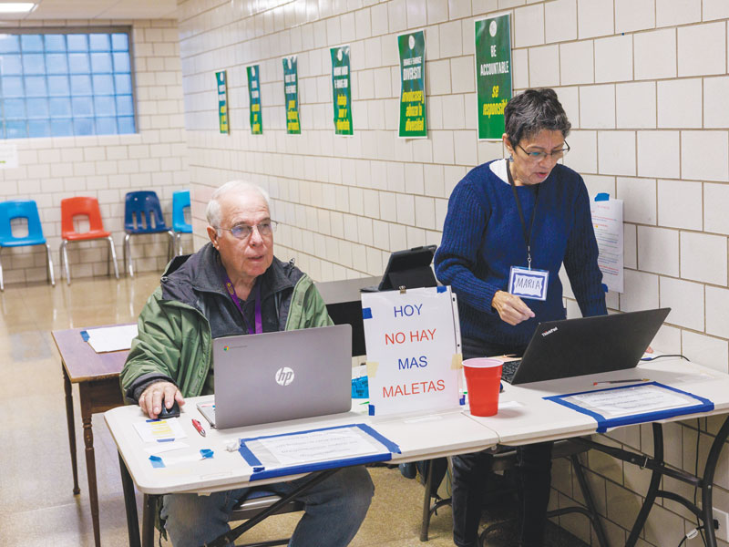 Don Woznica, shown with volunteer Maria Cardona, was a Maryknoll lay missioner before joining the Affiliates. He is now co-director of short-term services at St. Edmund Center. (Octavio Durán/U.S.)
