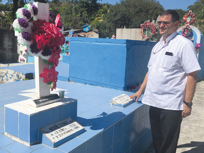 Bishop Oswaldo Escobar Aguilar of Chalatenango makes a yearly visit to the graves of Sisters Maura Clarke, Ita Ford and Carol Ann “Carla” Piette. The diocese commemorates all Salvadoran martyrs along with the religious women on the date of their murder. (CNS/Rhina Guidos/El Salvador)
