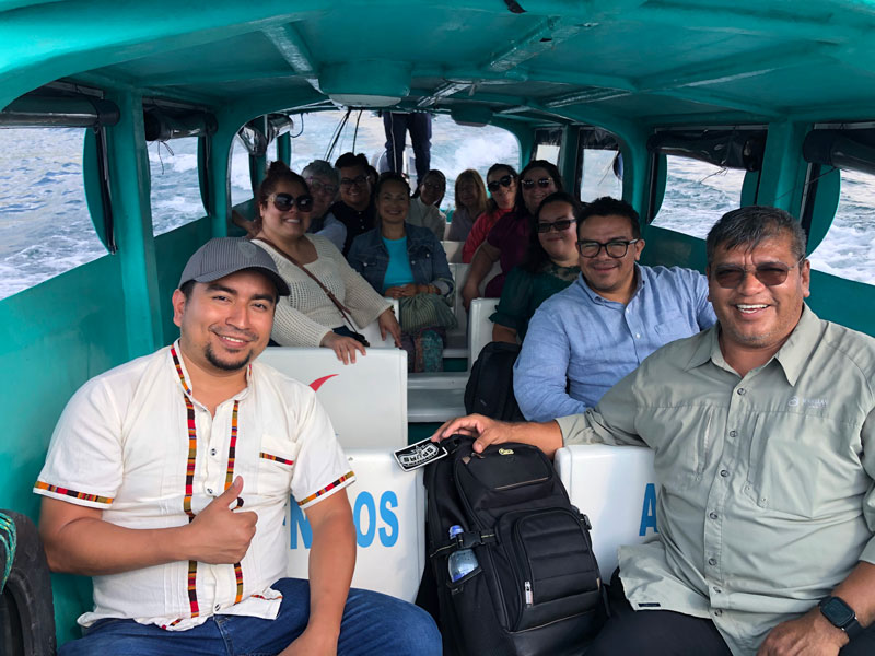 After World Mission Sunday Mass at St. Ferdinand Church, pastor Father Jason Torba and Cardinal Blase Cupich greet the congregation, including all those who do mission in Chicago. (Julie Jaidinger, Chicago Catholic/U.S.)