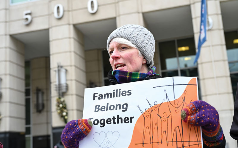 Susan Gunn, director of the Maryknoll Office for Global Concerns, vigils outside the U.S. Immigration and Customs Enforcement headquarters. (OSV News/Leslie E. Kossoff/U.S.)
