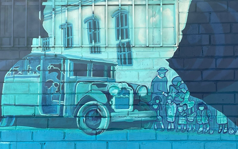 After World Mission Sunday Mass at St. Ferdinand Church, pastor Father Jason Torba and Cardinal Blase Cupich greet the congregation, including all those who do mission in Chicago. (Julie Jaidinger, Chicago Catholic/U.S.)