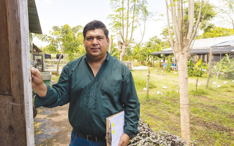 Santos Vásquez Hidalgo, a Maryknoll affiliate, has worked with Sister Smith since 2010. Having earned his degree as an agronomic engineer, he manages the hospice ecofarm, which includes 70 beehives at another location. (Octavio Durán/Guatemala)