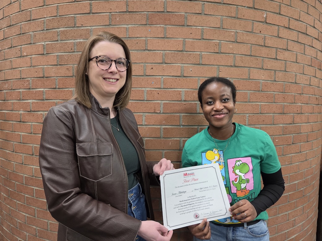 Sewa Adedayo, shown with her principal Amy Sanville, won the Bishop Patrick J. Byrne Award for Division II. Sewa attends Michael A. Riffel Catholic High School in Regina, Saskatchewan, Canada. (Courtesy of Stacy Allan/Canada)