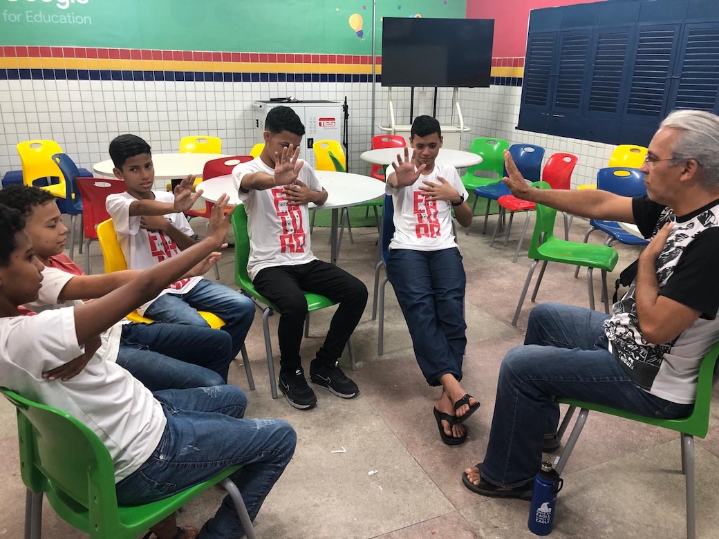 Maryknoll Lay Missioner Flávio José Rocha, the author’s husband, helps boys learn to manage their emotions through dynamics and exercises at Deputado Arnaldo School in João Pessoa, Brazil. (Courtesy of Kathleen Bond/Brazil)
