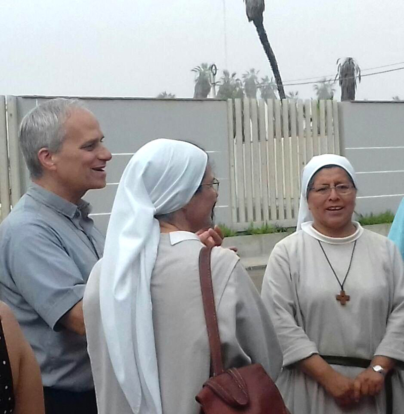 The future Pope Leo XIV visits with Augustinian sisters in Peru in this undated photo. As an Augustinian priest, then-Father Robert F. Prevost spent many years as a missionary in Peru and also served as bishop of that country's Diocese of Chiclayo. A Chicago native, he was elected pope May 8, 2025, at the Vatican, becoming the first American pope in history. (OSV News photo/courtesy Augustinian Sister Carmen Toledano)